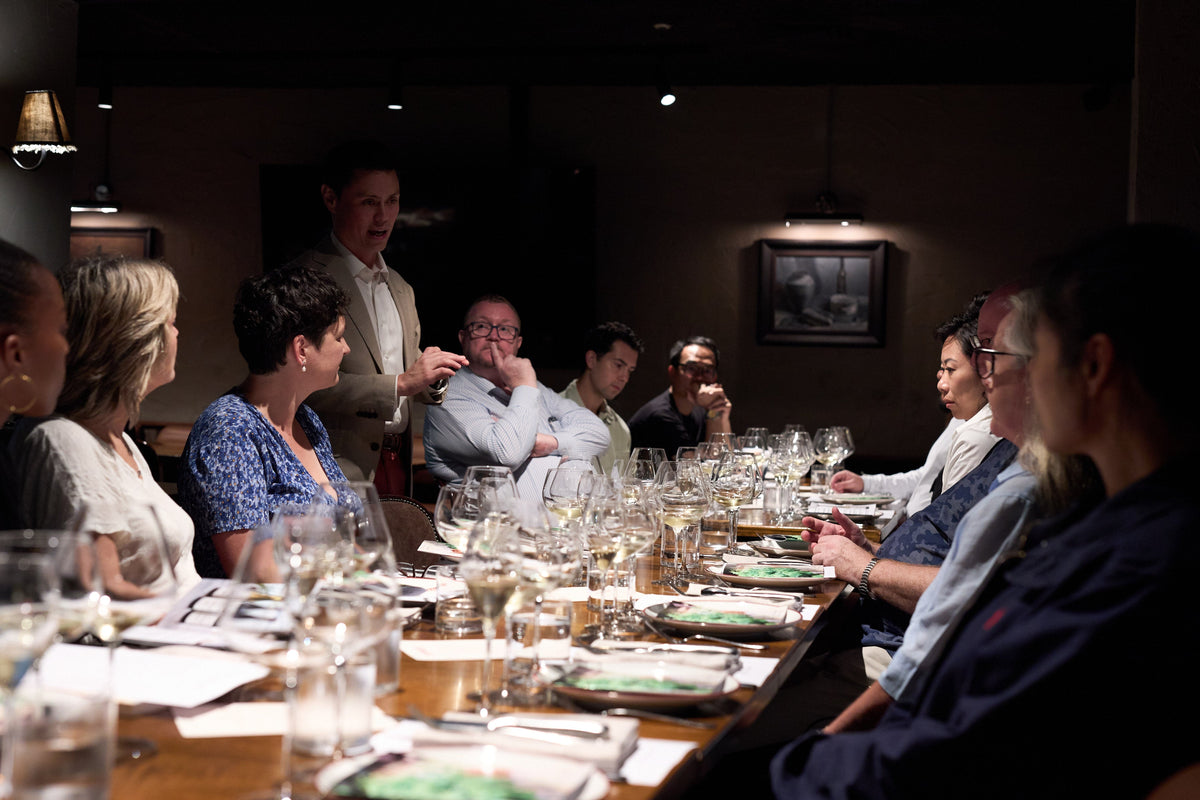 Group of people tasting different wines